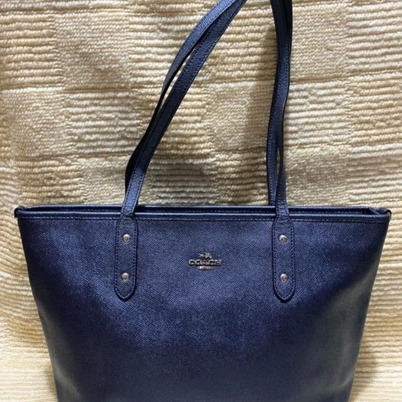 Coach Handbags - Coach Blue Tote Bag with Minimalist Design